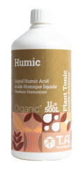 Bílá plastová lahev T.A. Humic 1l s hnědým etiketem obsahující tekuté huminové kyseliny pro stimulaci mikrobiálního života v půdě