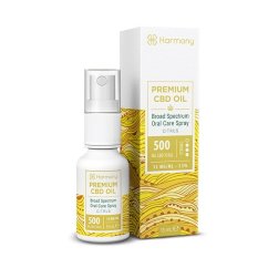 Spray alb cu pulverizator transparent Harmony Premium CBD Oil 500 mg cu aromă de citrice, lângă cutia de hârtie decorată cu aur
