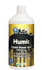Bílá plastová lahev T.A. Humic 500ml s žlutým štítkem obsahující tekutou huminovou kyselinu pro rostliny jako stimulátor růstu a zdraví
