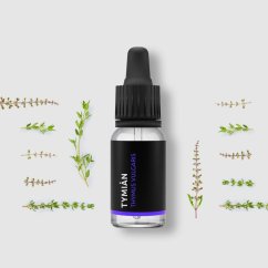Black glass bottle with pipette containing BIO thyme essential oil surrounded by fresh green herb twigs on light background